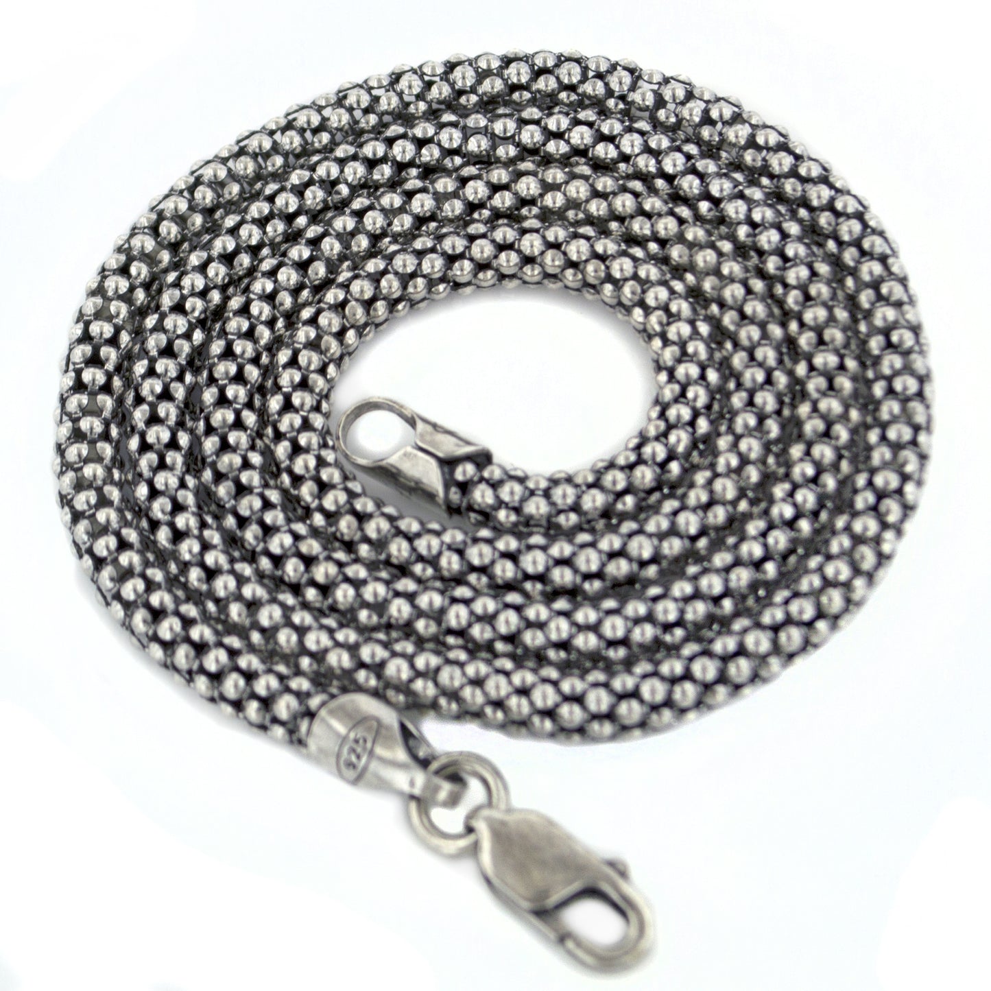 A coiled antiqued sterling silver popcorn chain with a lobster clasp.